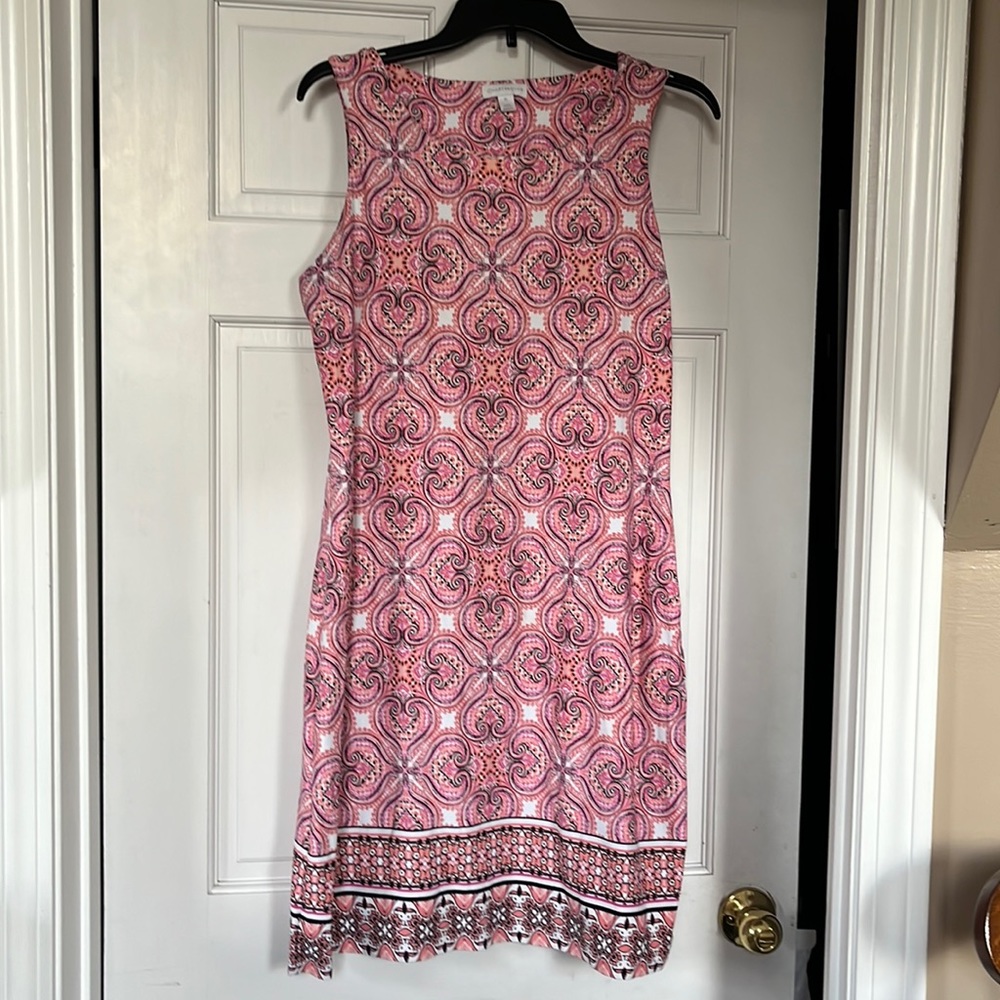 Womens sleeveless mid length pink printed dress.
